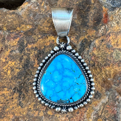 Kingman Turquoise Sterling Silver Pendant by Loretta Delgarito