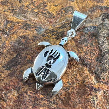 Sterling Silver Pendants by Norman Woody