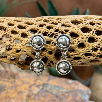 Artie Yellowhorse double dome sterling silver post earrings with rope borders