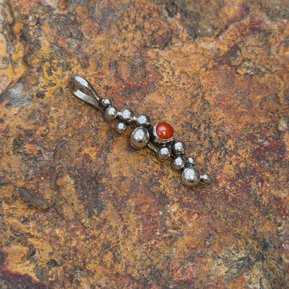 Ray Coriz Million Drops coral sterling silver pendant, angled front view