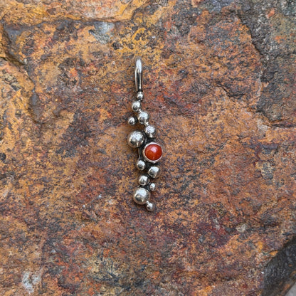 Ray Coriz coral pendant with silver dot details