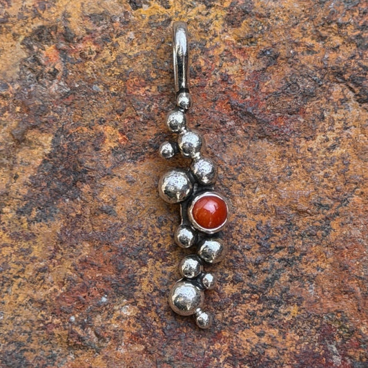 Ray Coriz coral pendant with silver dot details