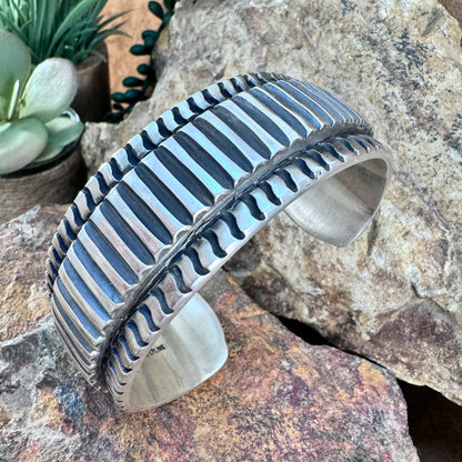 Sterling Silver Ribbed Cuff Bracelet with Hidden Sunburst Design by Elvira Bill