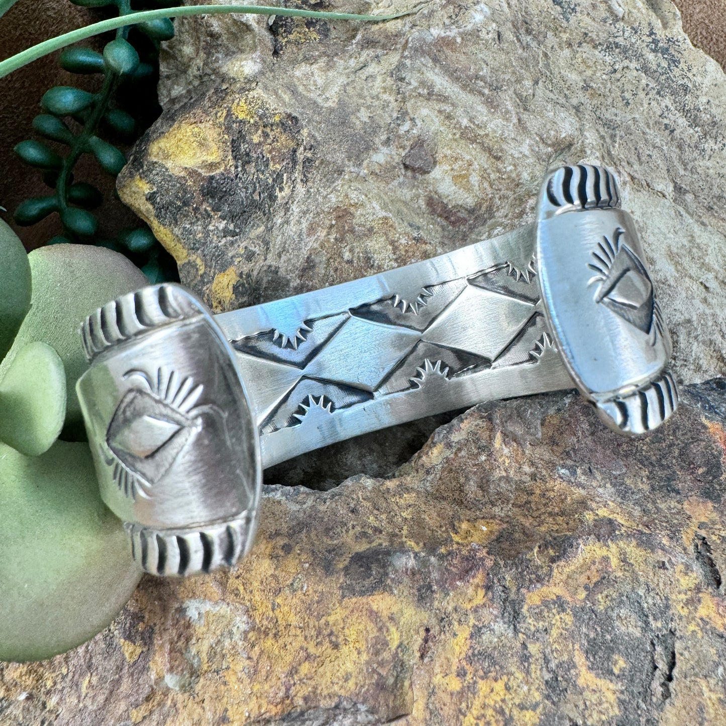 Sterling Silver Ribbed Cuff Bracelet with Hidden Sunburst Design by Elvira Bill