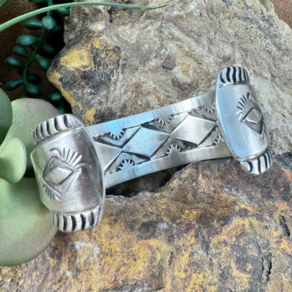 Sterling Silver Ribbed Cuff Bracelet with Hidden Sunburst Design by Elvira Bill