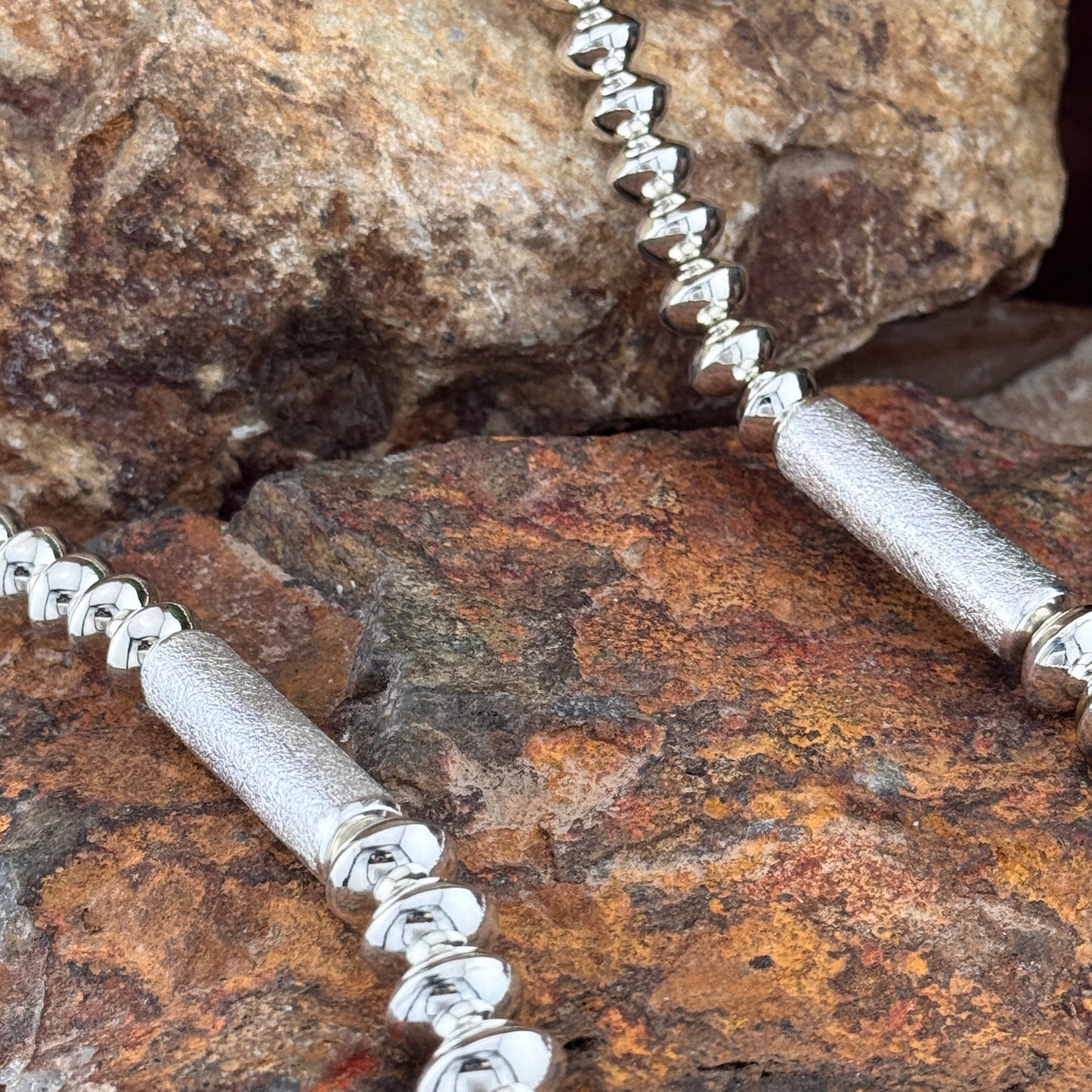 Stunning Polished Sterling Sliver Navajo Pearl necklace by Navajo artist Jack Tom