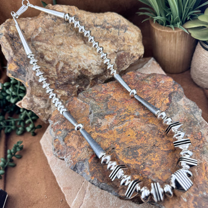 Stunning Polished Sterling Sliver necklace by Navajo artist Jack Tom
