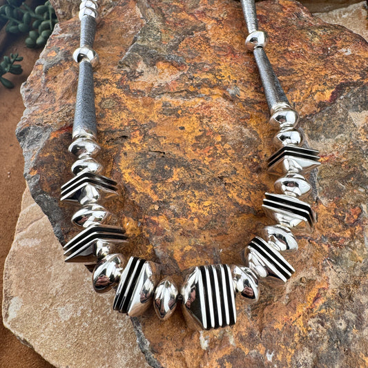 Stunning Polished Sterling Sliver necklace by Navajo artist Jack Tom