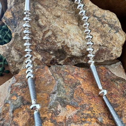 Stunning Polished Sterling Sliver necklace by Navajo artist Jack Tom