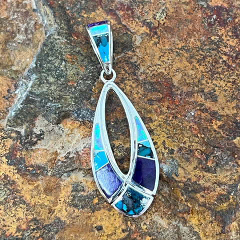 as part of the Shalako Collection features Sugilite, Tibetan Turquoise and Cultured Opa