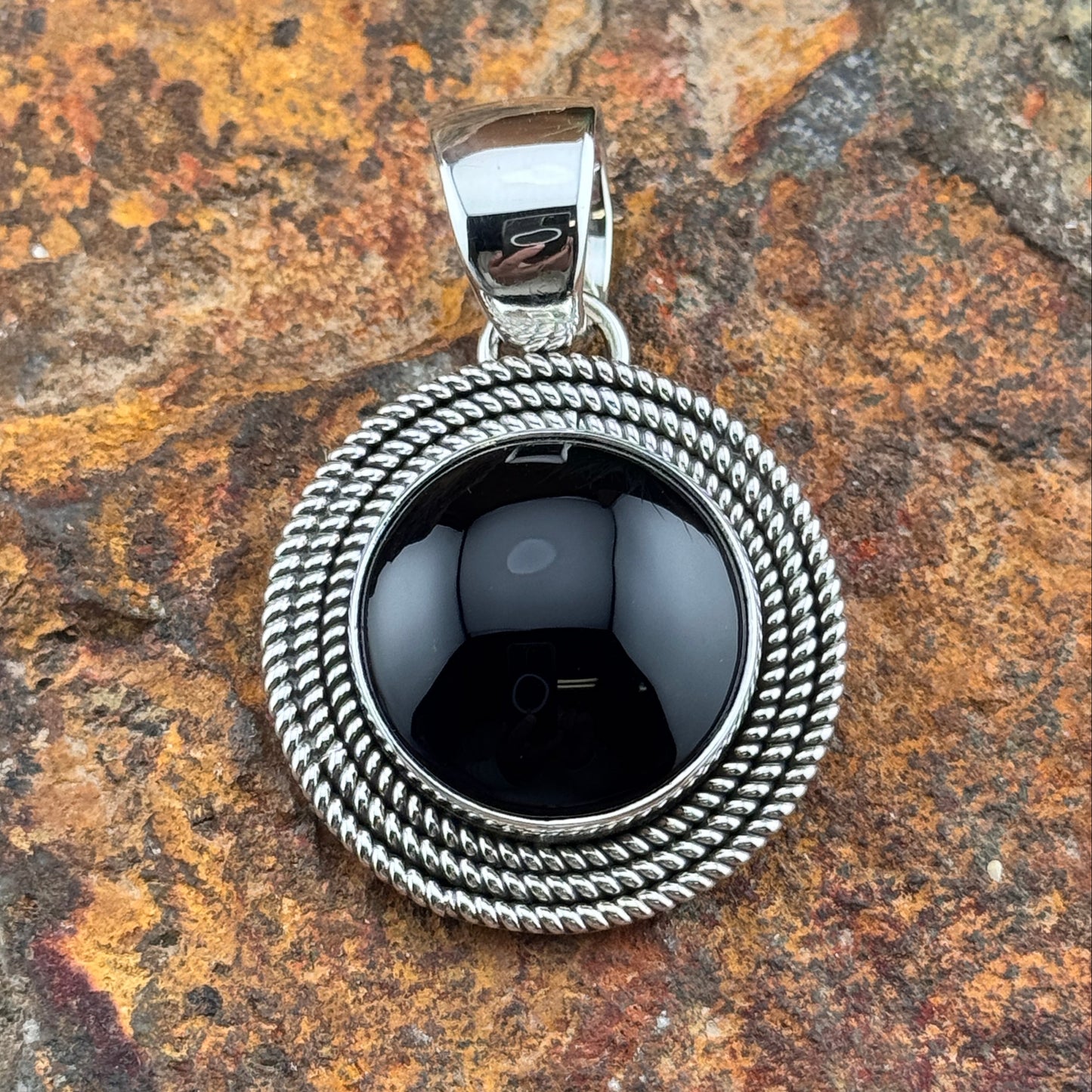 Sterling Silver Pendant with Black Onyx by Artie Yellowhorse