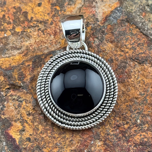 Sterling Silver Pendant with Black Onyx by Artie Yellowhorse