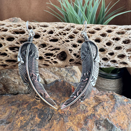 Dangle Feather Earrings by Lambert Perry
