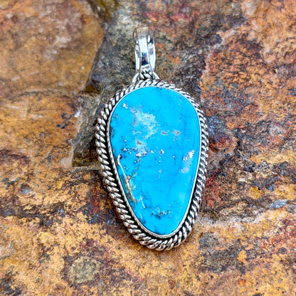 Kingman Turquoise Narrow Teardrop Pendant by Artie Yellowhorse, hallmark stamp