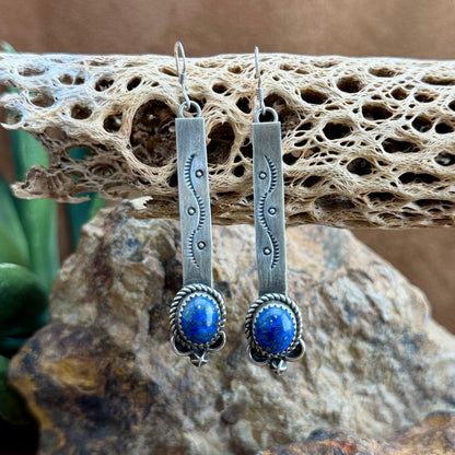 Silver earrings with blue stones 