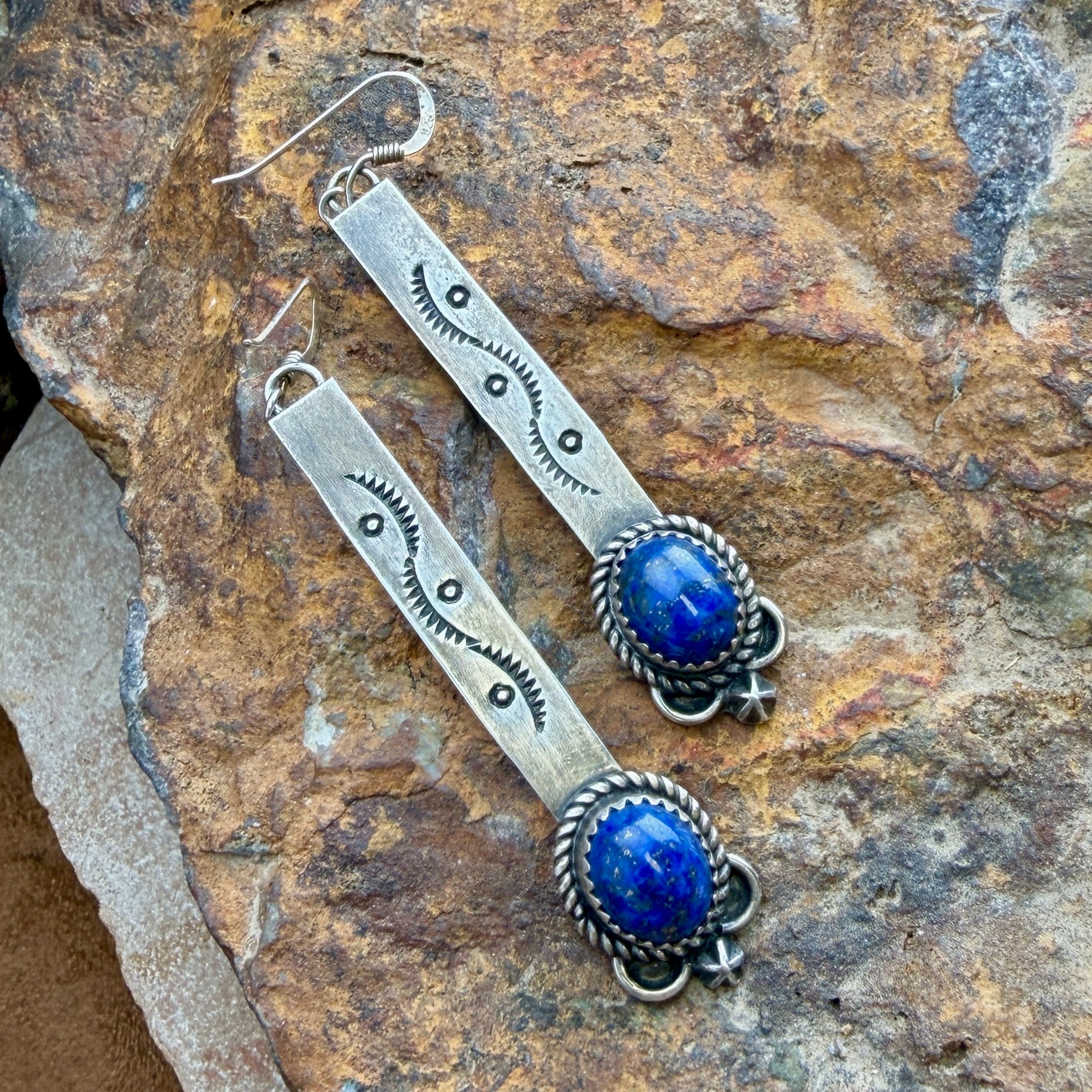 Silver earrings with blue stones