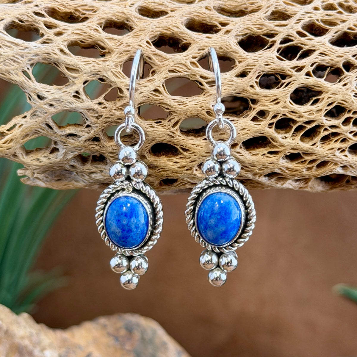 Alternate view of sterling silver lapis dangle earrings with polished bead accents