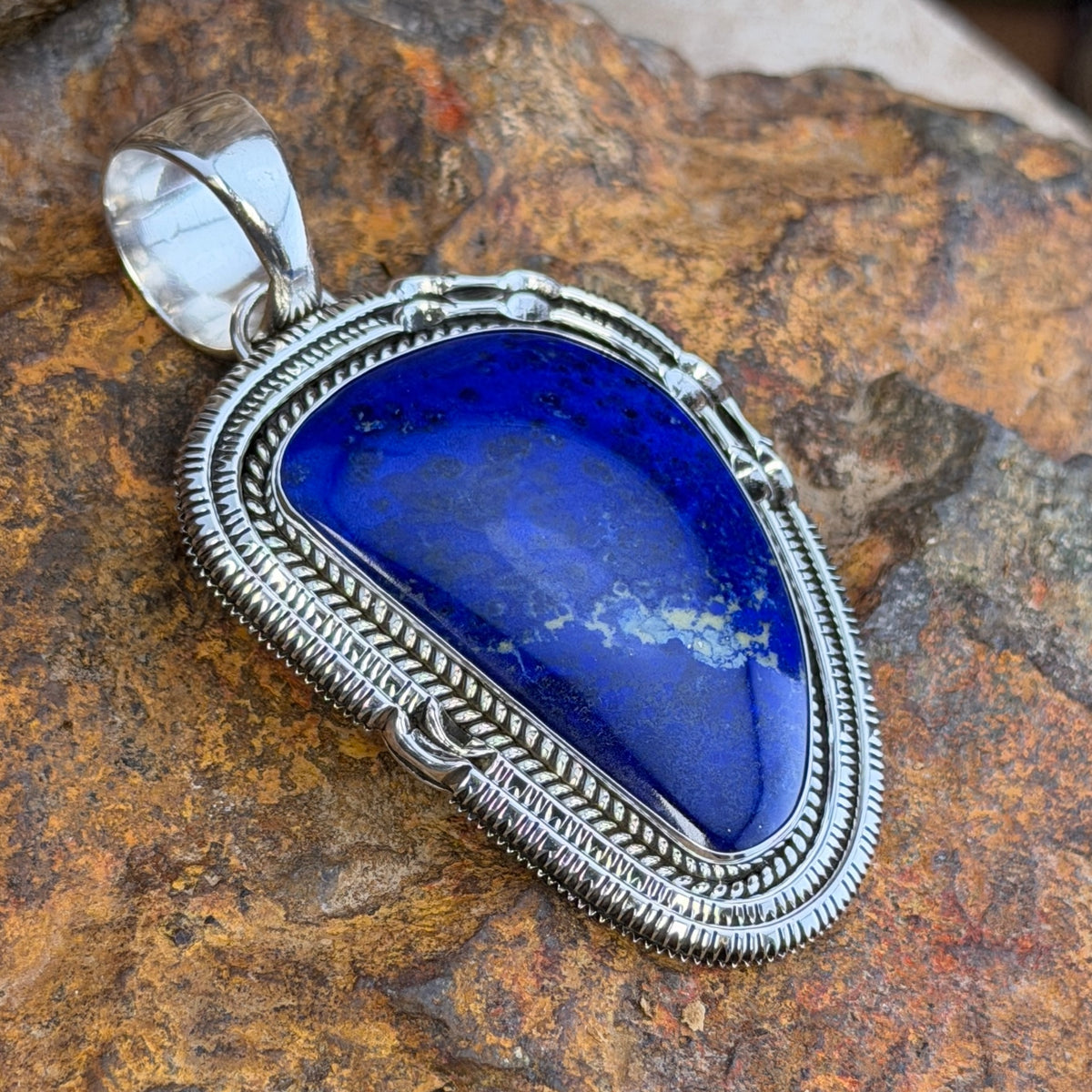 Royal Lapis Sterling Silver Pendant by Henry Chackee and Artie Yellowhorse, side view