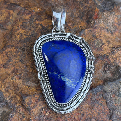 Royal Lapis Sterling Silver Pendant by Henry Chackee and Artie Yellowhorse, reverse with hallmarks