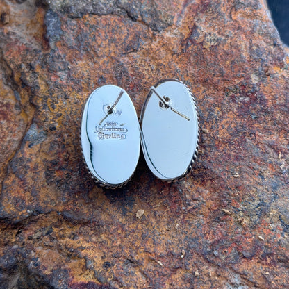 Pair of oval blue lapis lazuli post earrings in sterling silver with twisted-rope borders