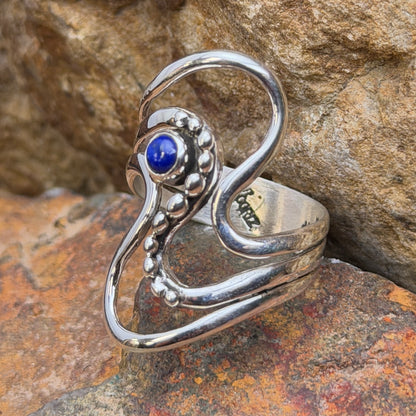 Side view of Ray Coriz lapis sterling silver wave ring