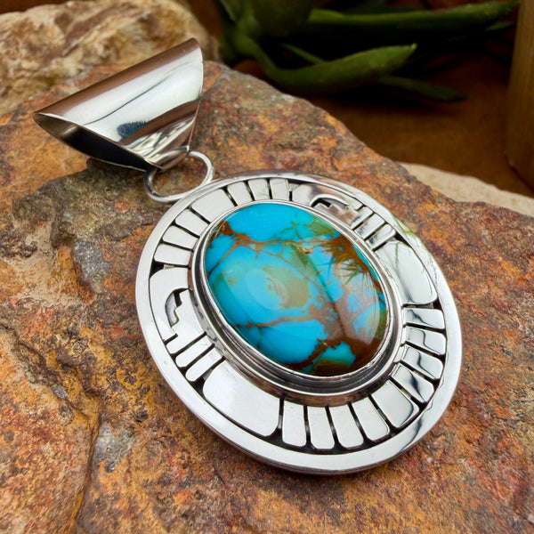 Bisbee Turquoise Sterling Silver Pendant by Leonard Nez