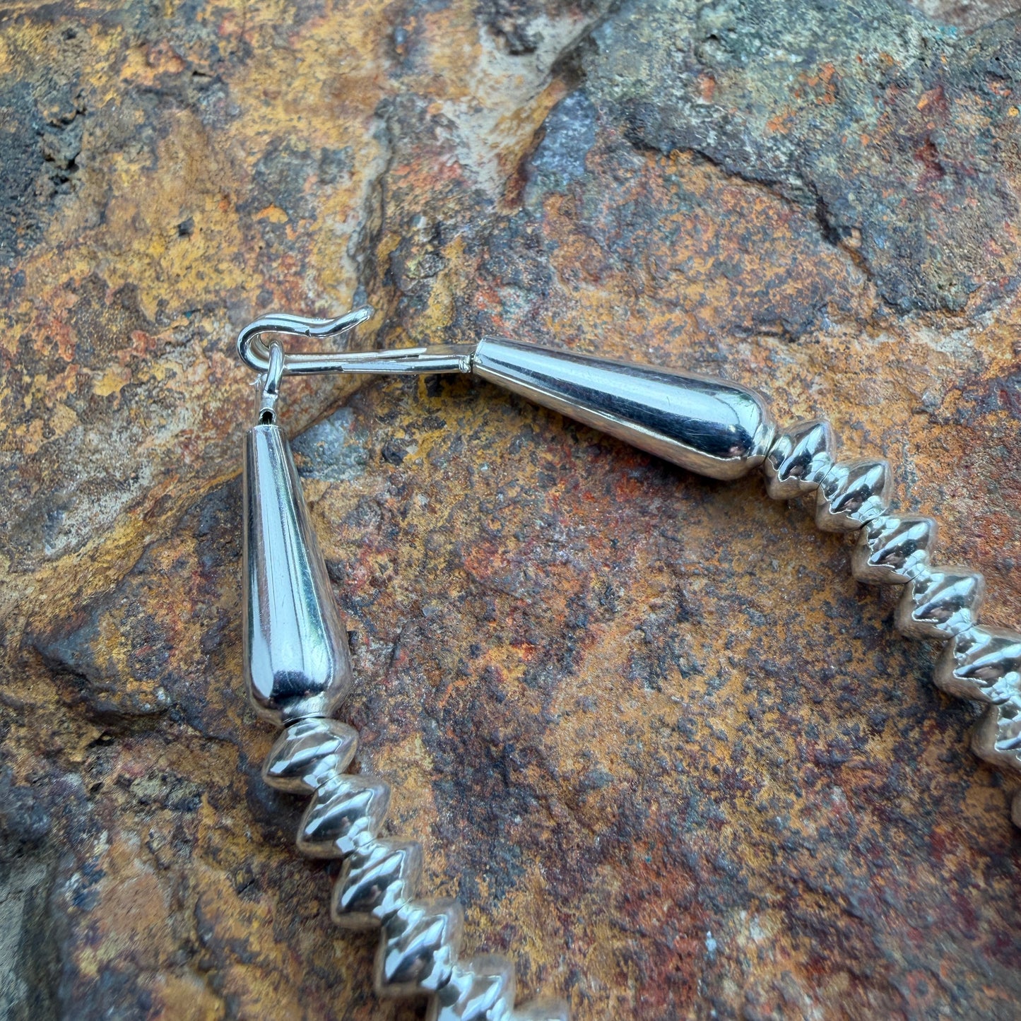 Close up picture on hook and eye clasp 