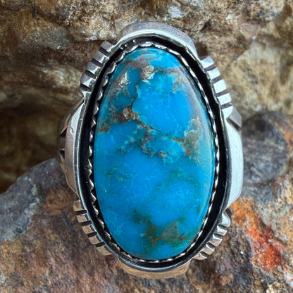 Lone Mountain Turquoise Ring by Ray Coriz - top view on rock showing full face of electric blue Lone Mountain turquoise cabochon