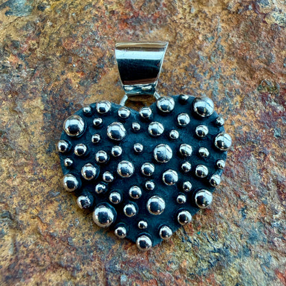 Million Drops Heart Shaped Pendant by Ray Coriz