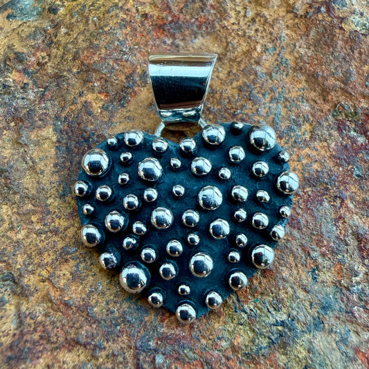 Million Drops Heart Shaped Pendant by Ray Coriz
