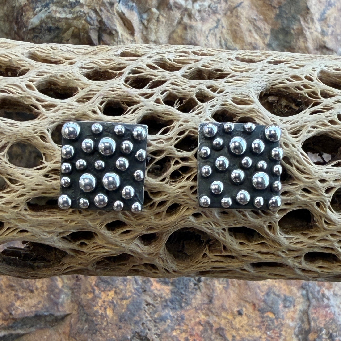 Million Drops Sterling Silver Square Post Earrings by Ray Coriz - front view showing oxidized silver with scattered silver drops