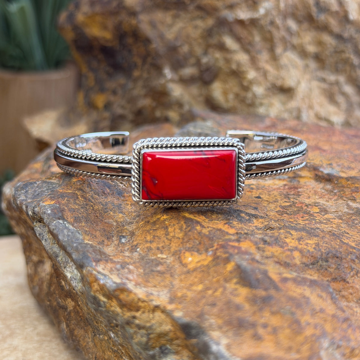 Narrow Rosarita Sterling Cuff Bracelet by Artie Yellowhorse, close up of stone. 