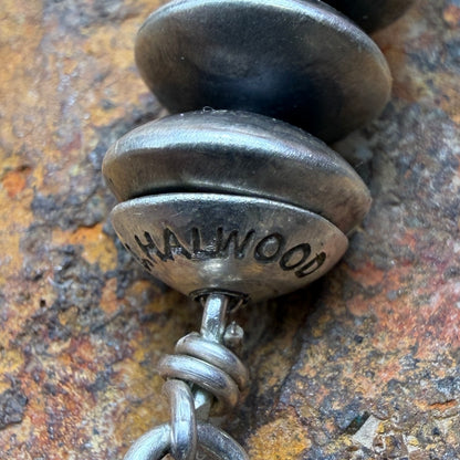 'HALWOOD' Stamp on a silver saucer bead