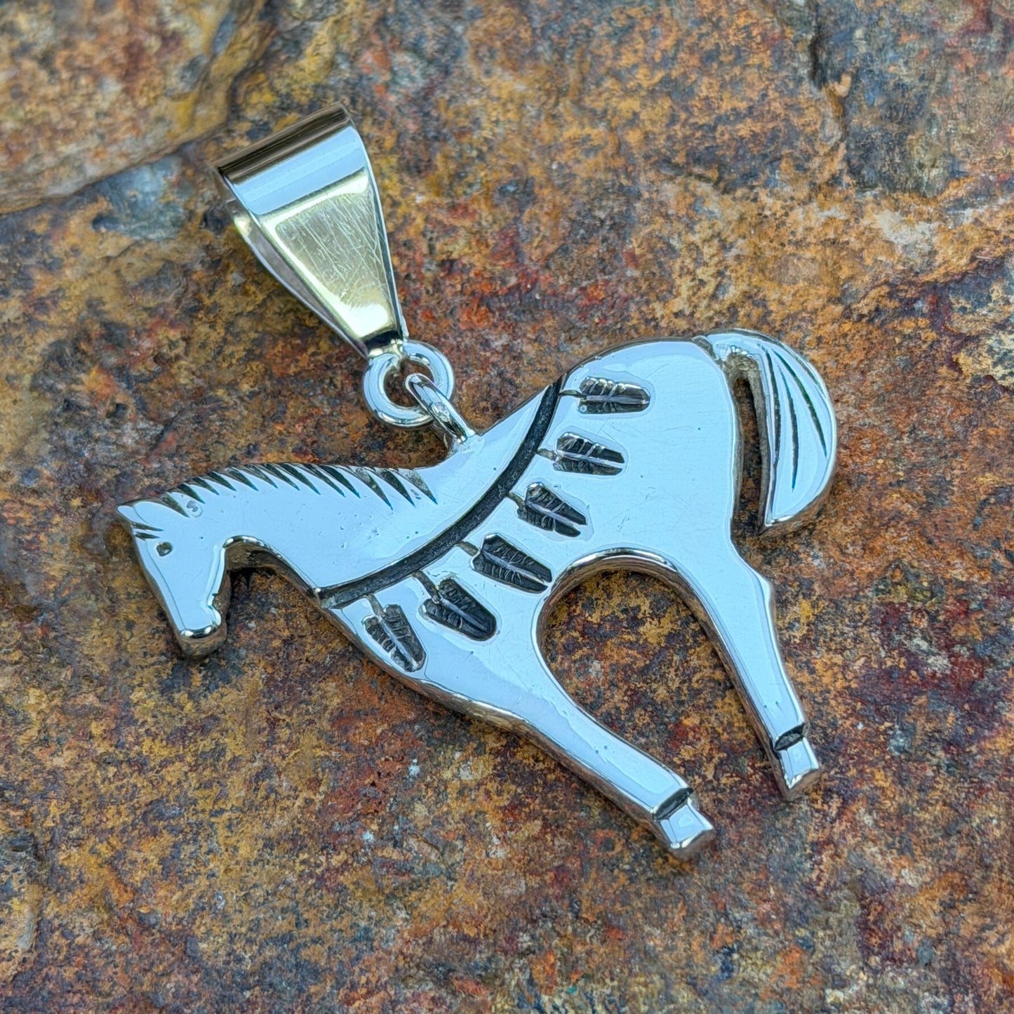 Sterling Silver Pendants by Norman Woody