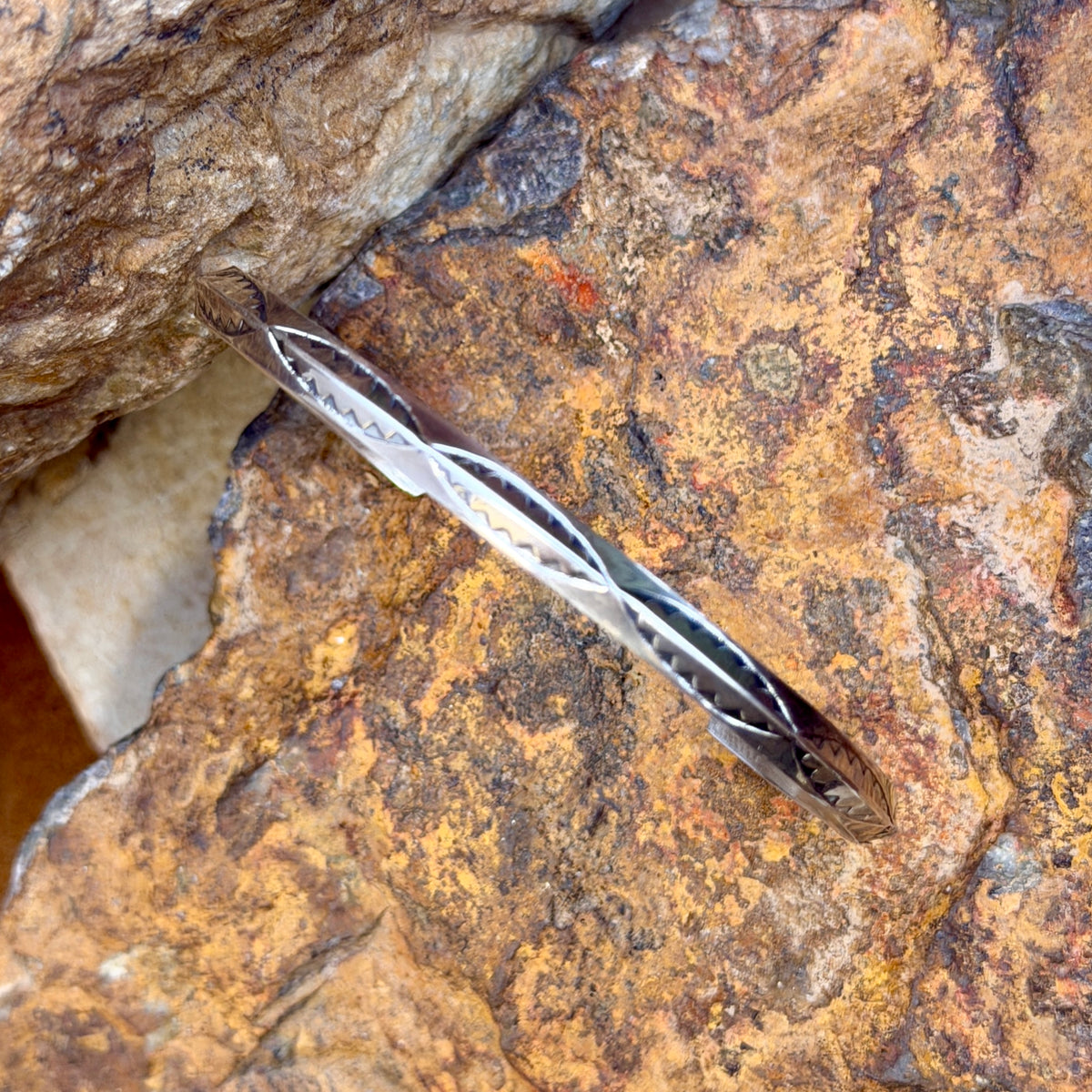 Verna Tahe oblong leaf stamped sterling silver knife-edge cuff