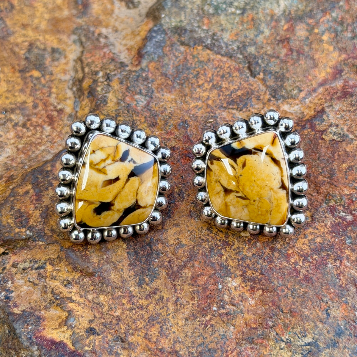 Peanut Wood Post Earrings by Artie Yellowhorse, close up