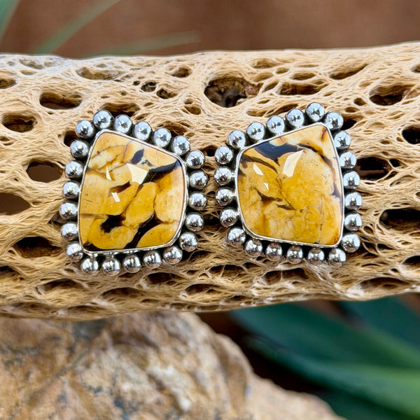 Peanut Wood Post Earrings by Artie Yellowhorse, angled view