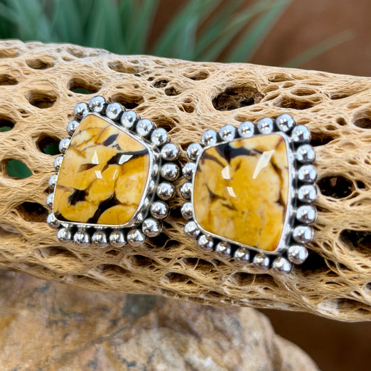 Peanut Wood Post Earrings by Artie Yellowhorse, hallmark stamp