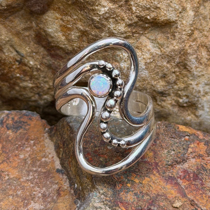 Ray Coriz opal sterling silver wave ring, angled front view