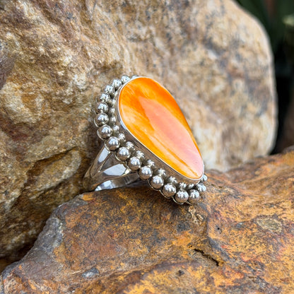 Orange Spiny Oyster Oblong Sterling Silver Ring by Artie Yellowhorse, angled view