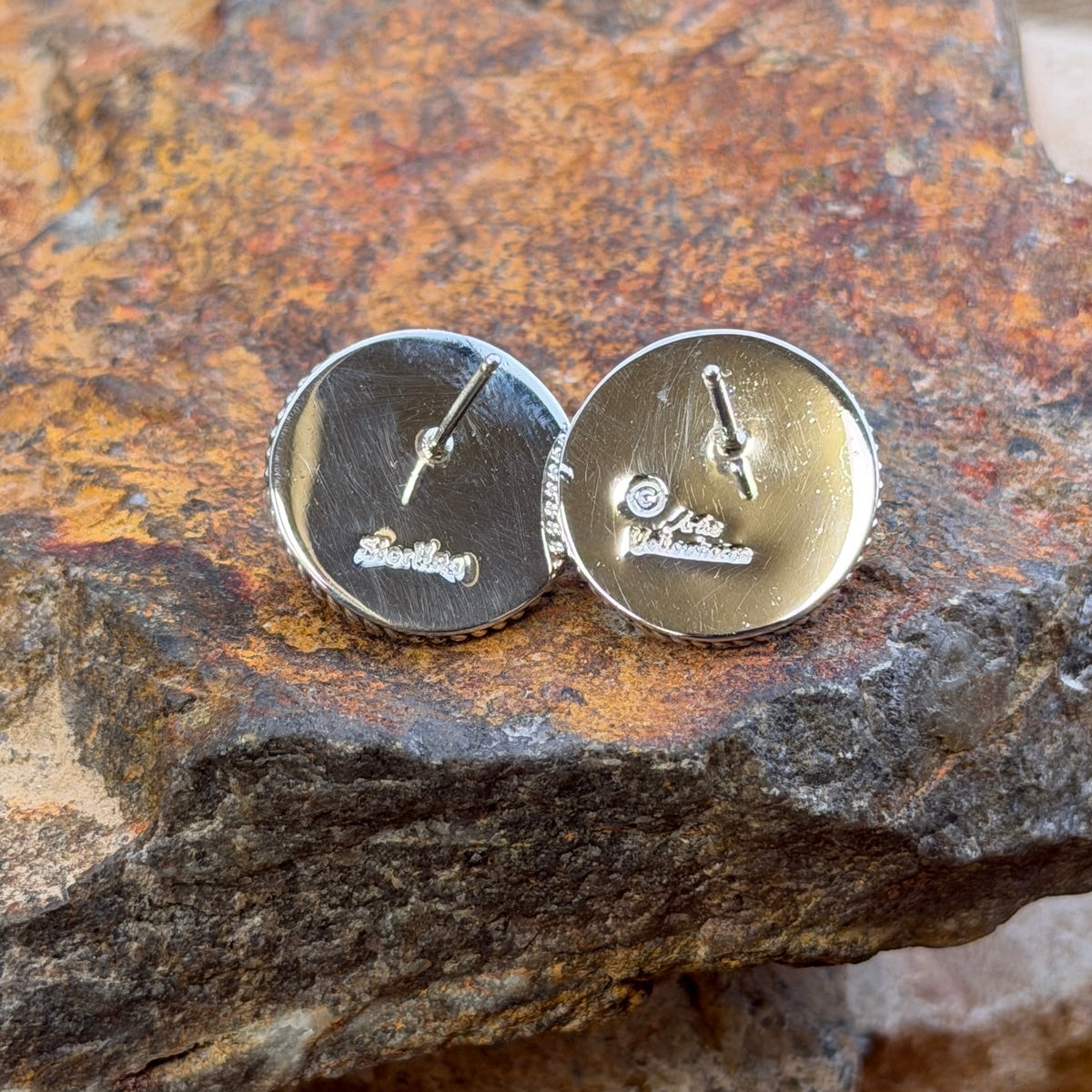 Sterling silver earring backs stamped Artie Yellowhorse