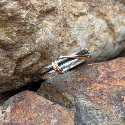 Sterling silver double-band ring with gold-tone wrapped accents, front view