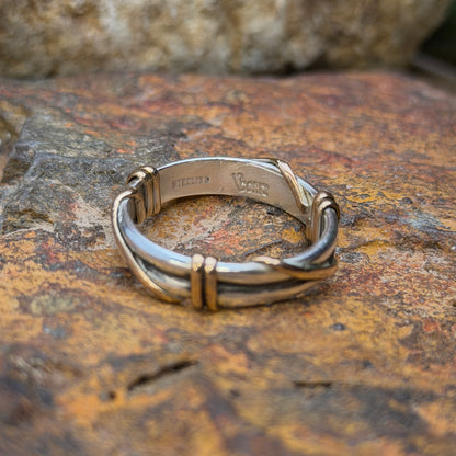 Interior Sterling marking and wrapped accents on silver ring