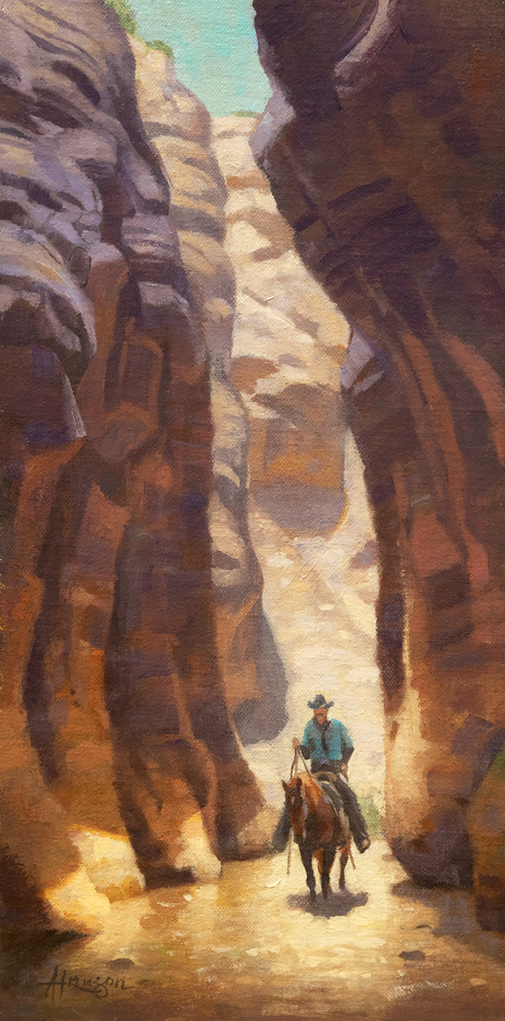 Painting of a cowboy on horseback in a desert canyon