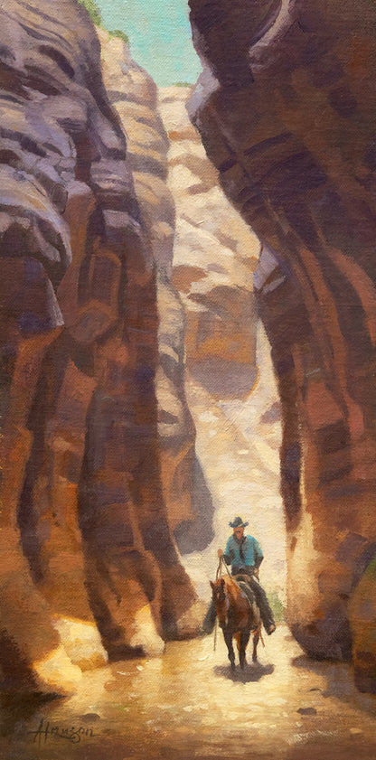 Painting of a cowboy on horseback in a desert canyon