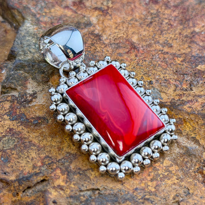 Rosarita Sterling Silver Square Pendant by Artie Yellowhorse, angled view