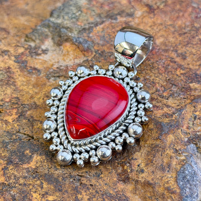 Rosarita Sterling Silver Teardrop Pendant by Artie Yellowhorse, angled view