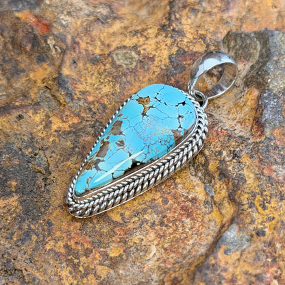 Side view of Royston turquoise sterling silver pendant