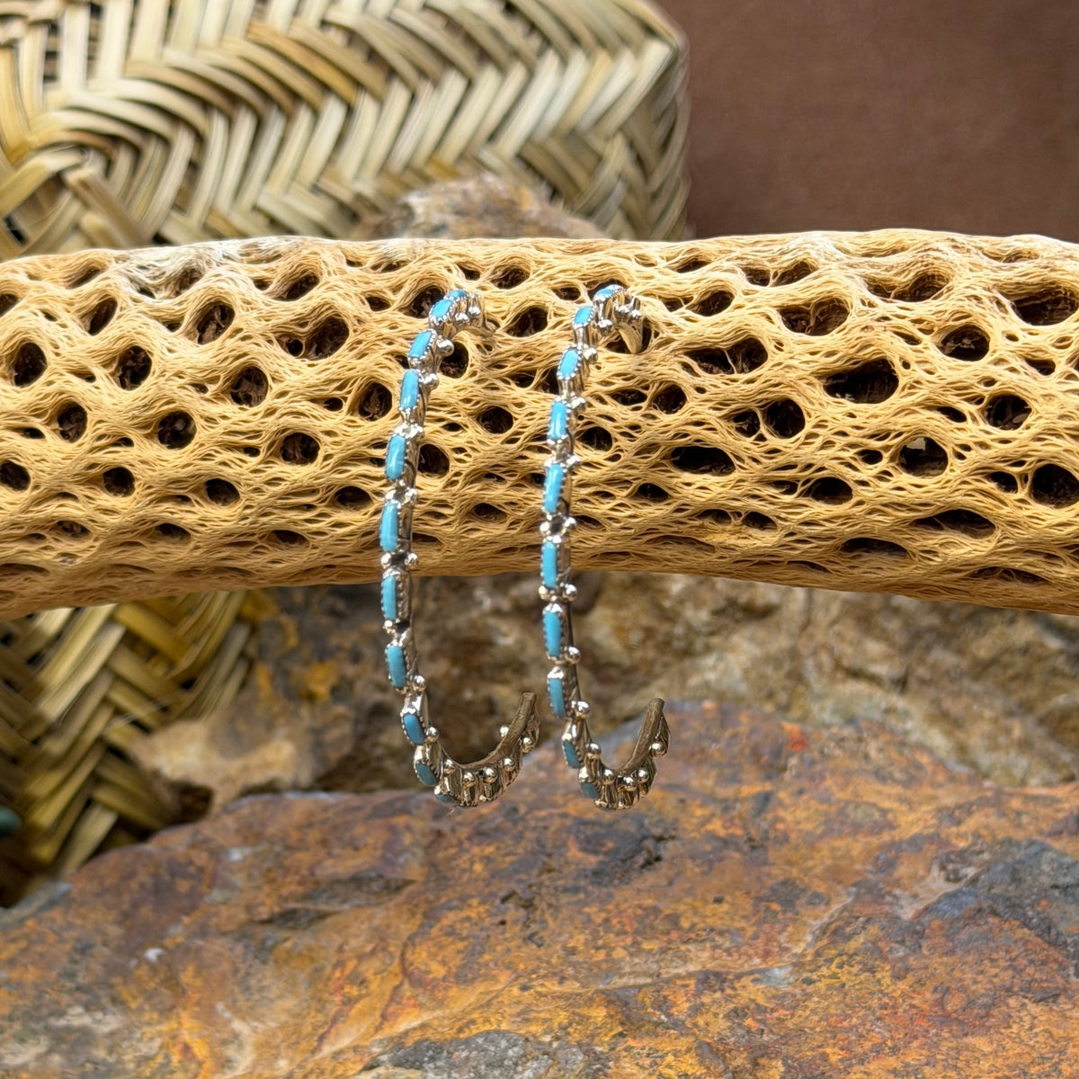Oblong turquoise stones and silver beads on A. Hughte hoops