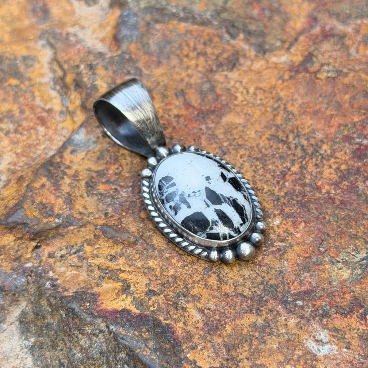 Sterling Silver Oval White Buffalo Pendant by Angela Martin